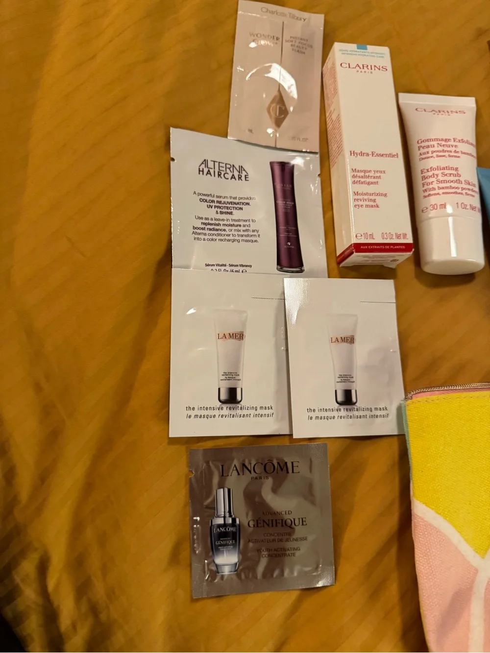 Clarins Pouch with Clarins and other product samples